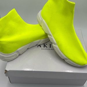 Lime green slip on sneaker boot
